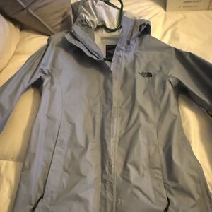 North Face women’s rain jacket. Very gently used. Like new condition.